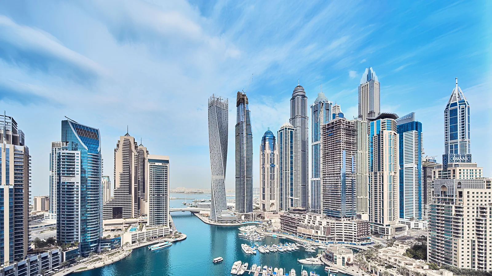 luxury apartments and penthouses overlooking a scenic canal